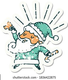 worn old sticker of a tattoo style santa claus christmas character celebrating