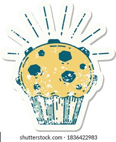 worn old sticker of a tattoo style chocolate muffin