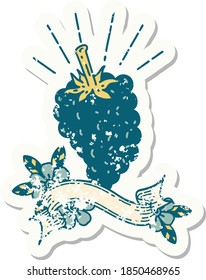 worn old sticker of a tattoo style bunch of grapes