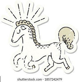 worn old sticker of a tattoo style prancing stallion