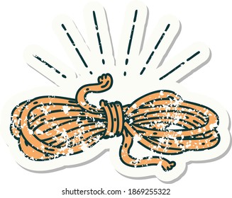 worn old sticker of a tattoo style wound rope