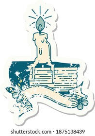 worn old sticker of a tattoo style candle melting on book
