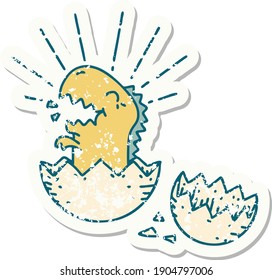 worn old sticker of a tattoo style hatching dinosaur