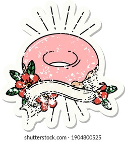 worn old sticker of a tattoo style iced donut