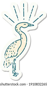 worn old sticker of a tattoo style standing stork