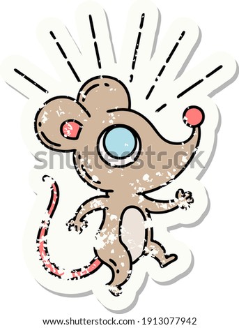 worn old sticker of a tattoo style mouse character