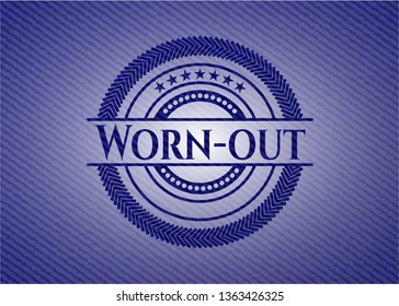 Worn-out emblem with jean background