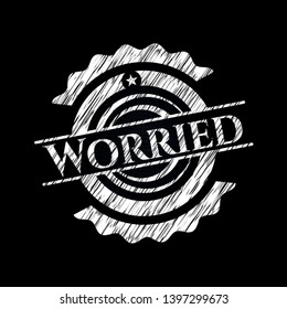 Worried chalk emblem written on a blackboard. Vector Illustration. Detailed.