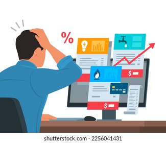 Worried man sitting at desk and checking expensive utility bills on his computer, payments and budget concept