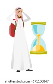 Worried muslim traveler man clutching his head while looking at hourglass. Young traveler concerned by the end of countdown of hourglass. Vector flat design illustration isolated on white background.