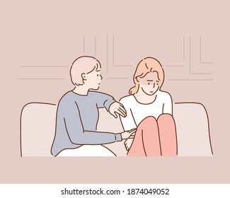 Worried woman comforting a depressed friend sitting on a couch at home. Hand drawn style vector design illustrations.