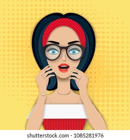 Wow pop art face in paper art style. Young surprised woman with blonde curly hair and open mouth and hands up. Advertising poster with confused paper girl.
