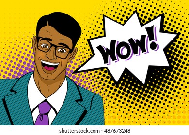 Wow pop art man. Happy young handsome surprised  man in glasses and suit with open mouth, with dark skin and speech bubble. Vector colorful cartoon background in retro comic style. 