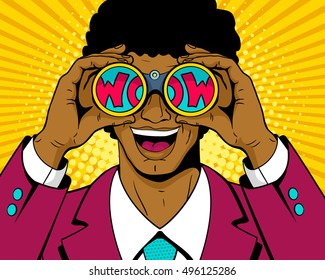 Wow pop art man. Surprised afro american man in suit with open mouth holding binoculars in his hands with inscription wow in reflection. Vector illustration in retro comic style. Pop art background.