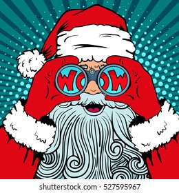 Wow pop art Santa Claus with surprised face, open mouth holding binoculars in his hands with inscription wow in reflection. Vector illustration in retro pop art comic style Christmas party invitation.