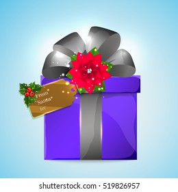 Wrapped gift box with big satin bow and tag.