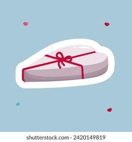 regalo envuelto en una caja en forma de corazón
