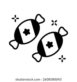 Wrapped toffees icon designed in glyph style