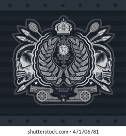 wreath with cross arrows between profile skulls and cannon. Heraldic vintage label on blackboard
