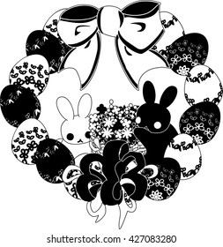 Wreath of Easter eggs and rabbits.