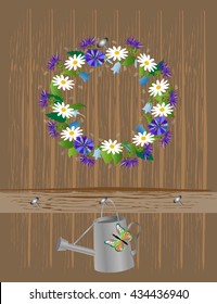 a wreath of flowers on wooden wall