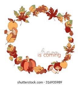 Wreath made of autumn leaves, mushrooms, apples and pumpkin. Can be used for wedding and greeting cards, seasonal template design. Based on hand drawn elements.