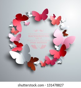 wreath made of white red and pink paper butterflies with free space for your text in the middle