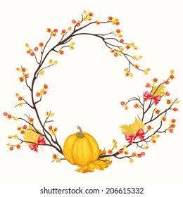 Wreath with pumpkin, leaves, bows and oriental bittersweets.