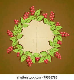 Wreath of red berries with green leaves