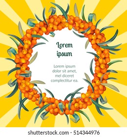 Wreath of ripe sea buckthorn berries with space for text