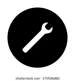 Wrench and circle on white