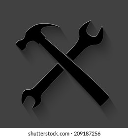 wrench and hammer icon - black vector illustration with shadow on dark background