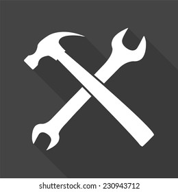 wrench and hammer icon - vector illustration with long shadow isolated on gray 