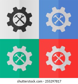 Wrench and hammer settings vector icon. Effect of folded paper. Colored (red, blue, green) illustrations. Flat design