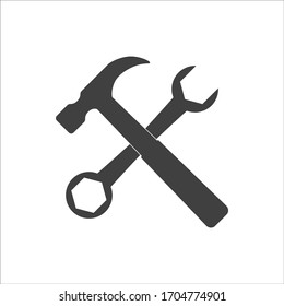 Wrench and hammer. Tools icon isolated on white background.