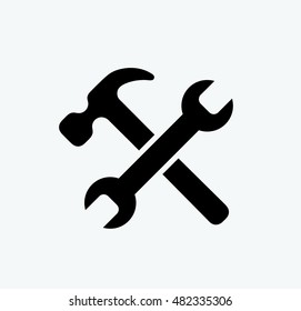 Wrench and hammer. Tools icon isolated on white background.