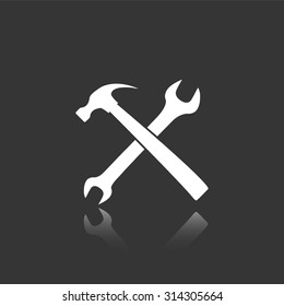 wrench and hammer vector icon with mirror reflection