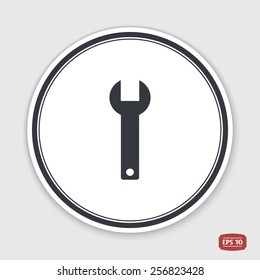 Wrench icon. Flat design style. Made in vector. Emblem or label with shadow.