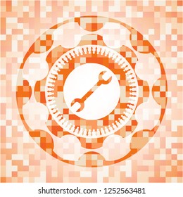 wrench icon inside abstract emblem, orange mosaic background