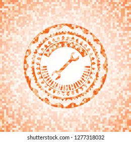 wrench icon inside abstract orange mosaic emblem with background