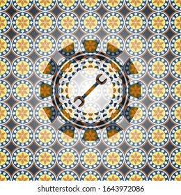 wrench icon inside arabesque emblem. arabic decoration.