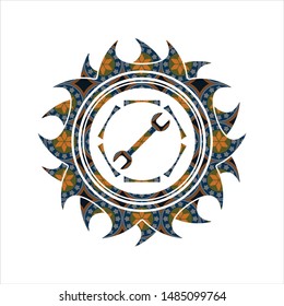 wrench icon inside arabic badge. Arabesque decoration.