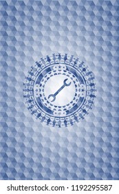 wrench icon inside blue hexagon emblem.