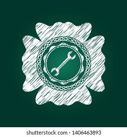 wrench icon inside chalk emblem