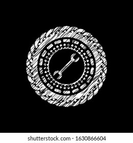 wrench icon inside chalk emblem
