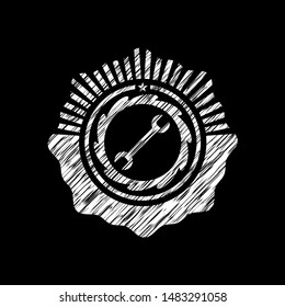 wrench icon inside chalkboard emblem written on a blackboard