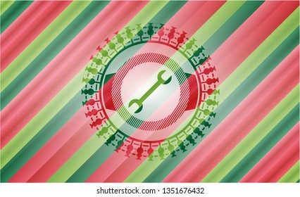 wrench icon inside christmas colors style emblem.
