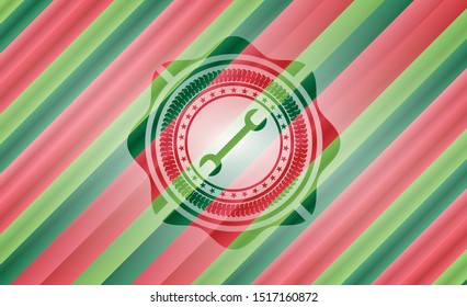 wrench icon inside christmas emblem background.