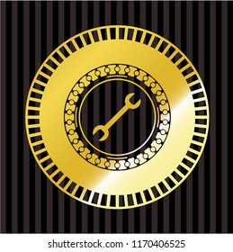 wrench icon inside gold badge