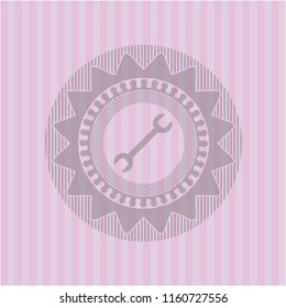 wrench icon inside pink emblem. Retro